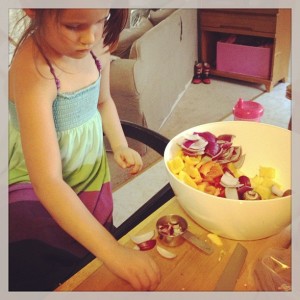 my favorite kitchen helper learned how to chop pineapple and skewer kabobs with me the other day